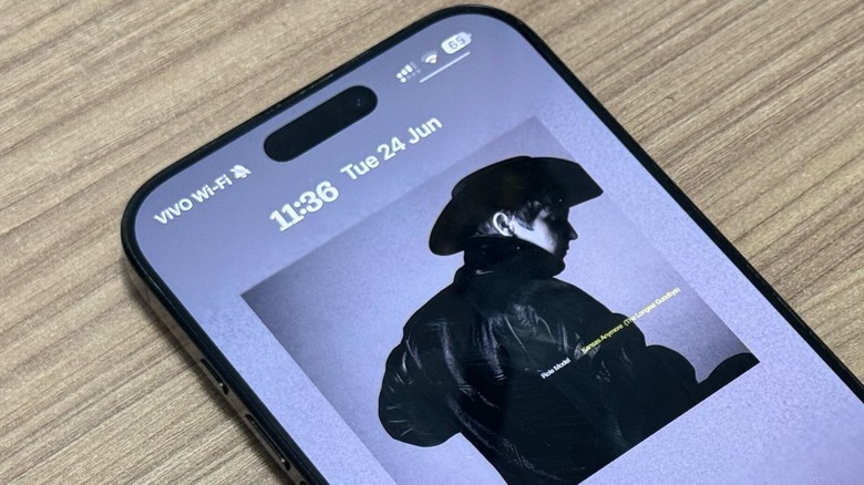 iOS 26 Apple Music on iPhone 16 Pro Max Lock Screen