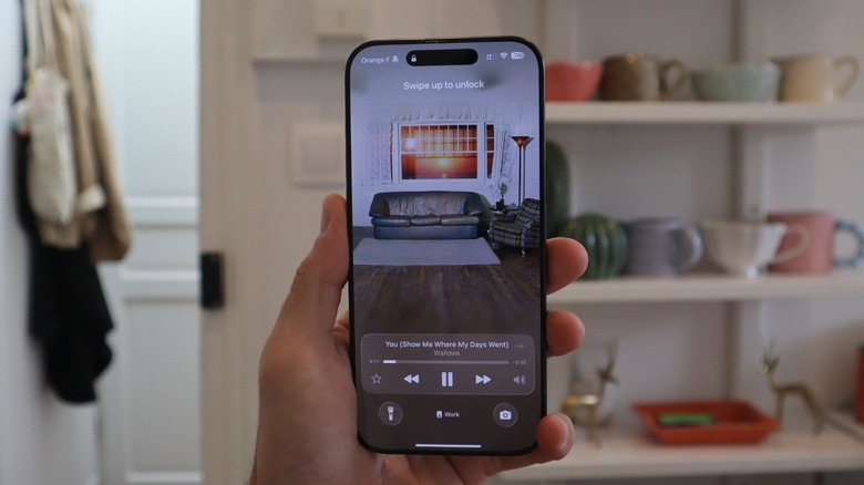 iOS 26 Apple Music on iPhone 16 Pro Max Lock Screen