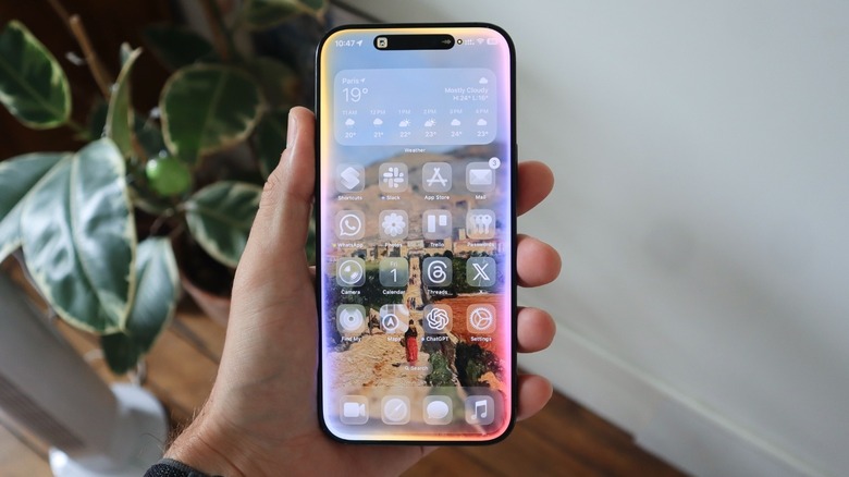 iOS 26's new Home Screen with updated Liquid Glass icons