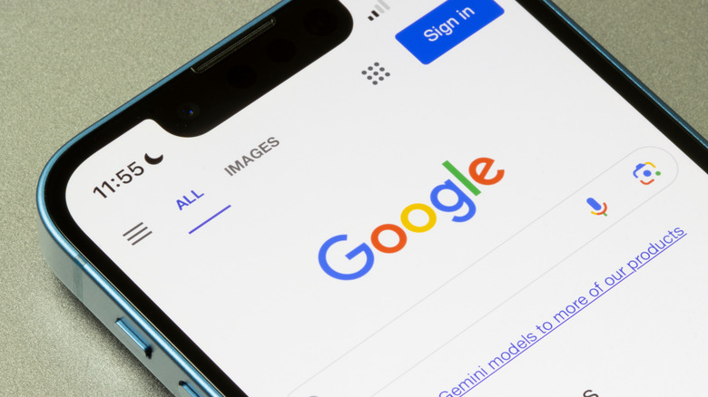 Google homepage open on an iPhone display