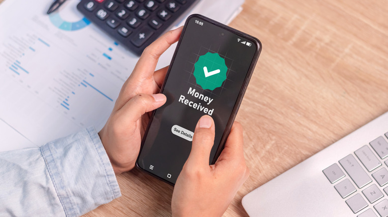 A concept of sending and receiving money using an Android phone.