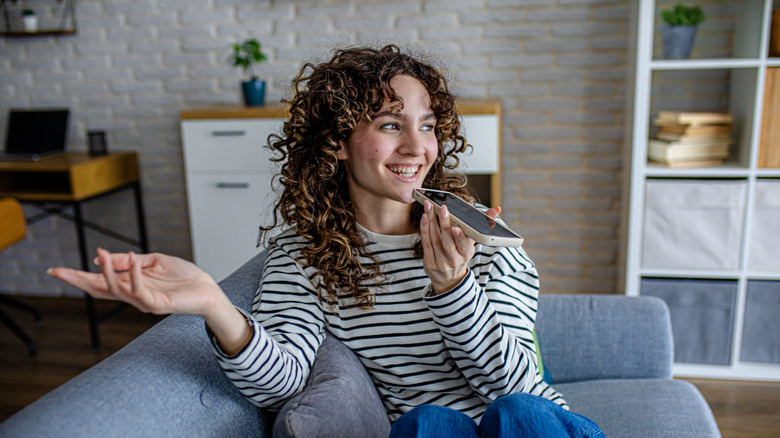 woman talking to iphone