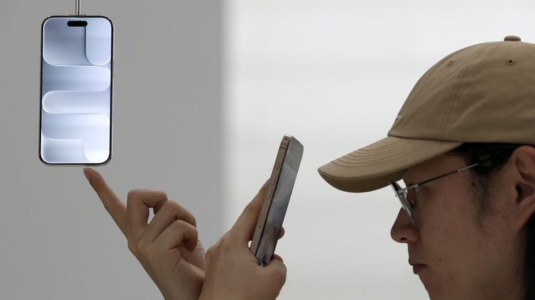 A user photographing the iPhone Air.