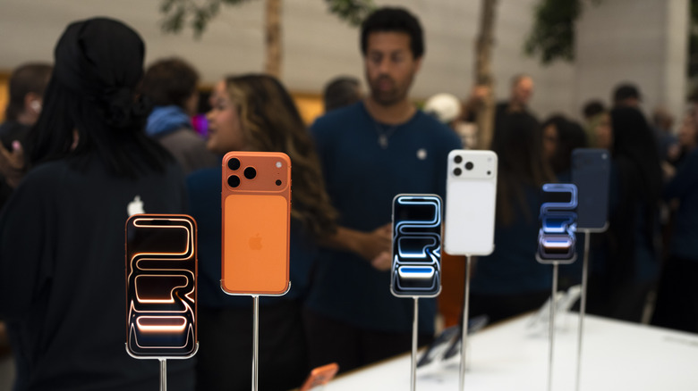 The iPhone 17 Pro models on display in a store.