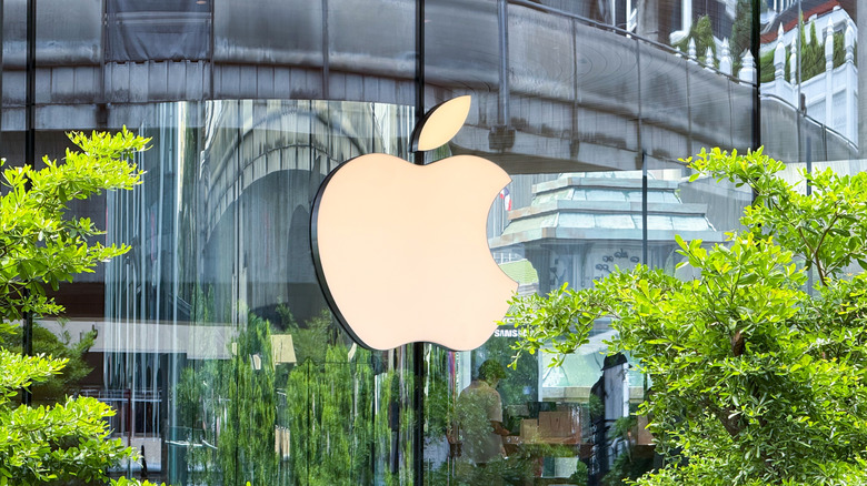 An Apple logo on a retail store.