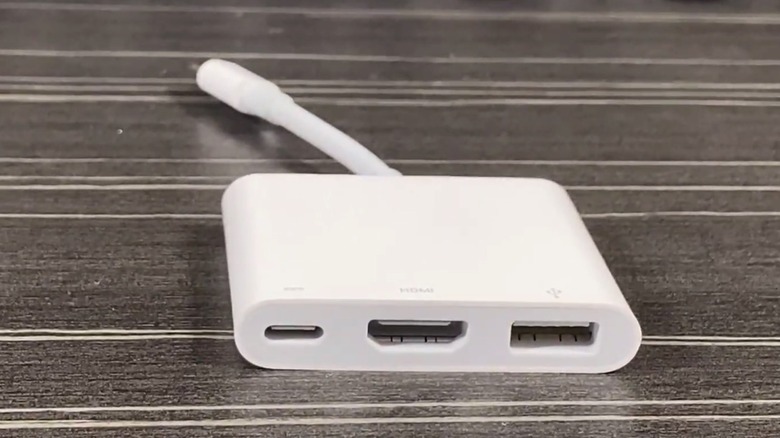 Apple's USB-C Digital AV Multiport Adapter on a desk.