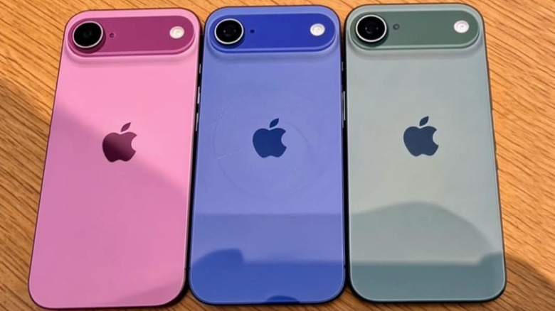 iPhone Air models lined up on wood table