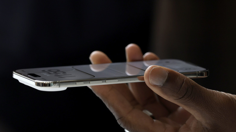 The ultra-thin iPhone Air in hand.