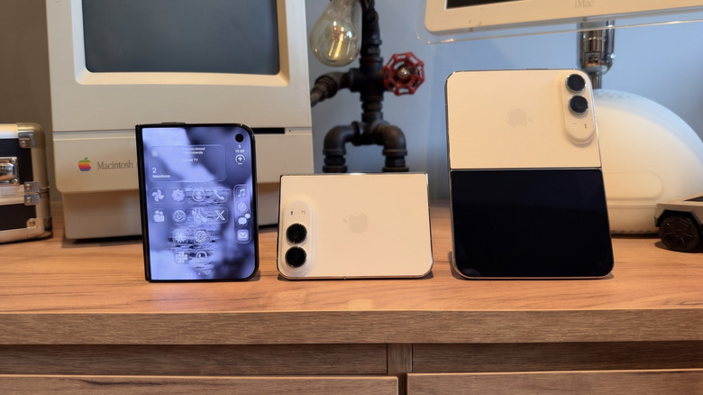 Three iPhone Duos on a desk in different orientations that appear to spell out 