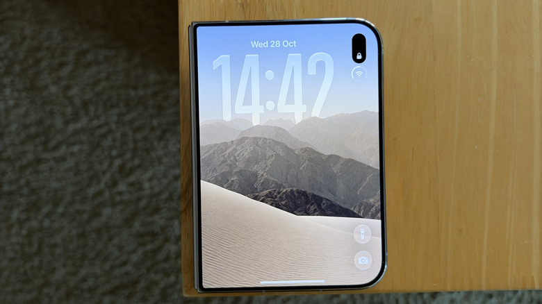 iPhone Duo sat folded on a wood table