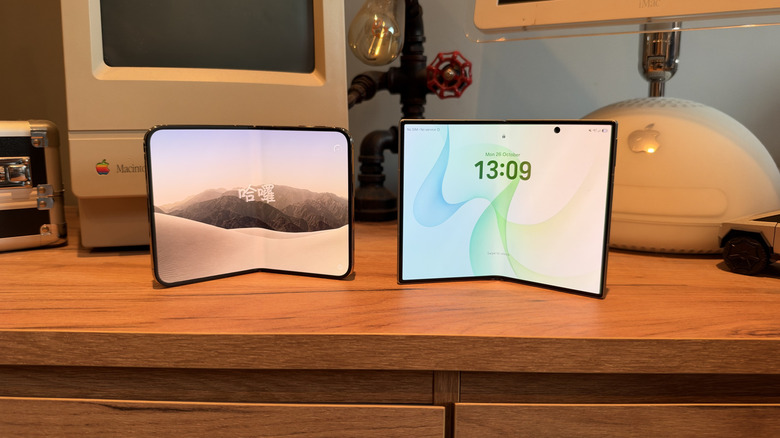 iPhone Duo and Samsung Galaxy Fold 8 stood next to one another on a desk