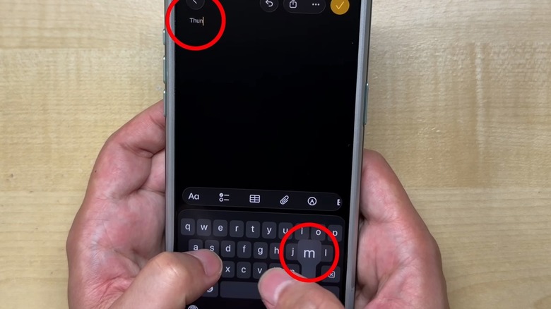 The iOS 26 keyboard bug shown in a slow-motion typing video.
