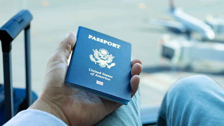 US passport in a travelers hand