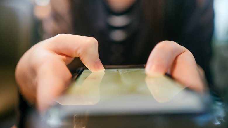 A person using a mobile device