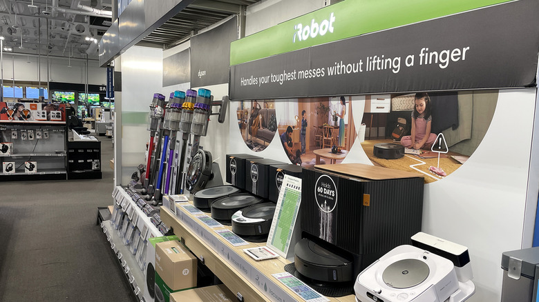 Roomba models displayed in a store