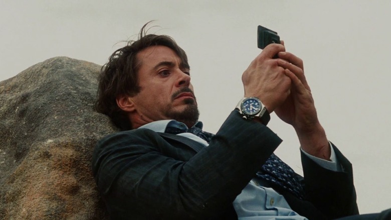 Tony Stark (Robert Downey Jr.) typing on an LG VX9400 cell phone from the film Iron Man (2008).
