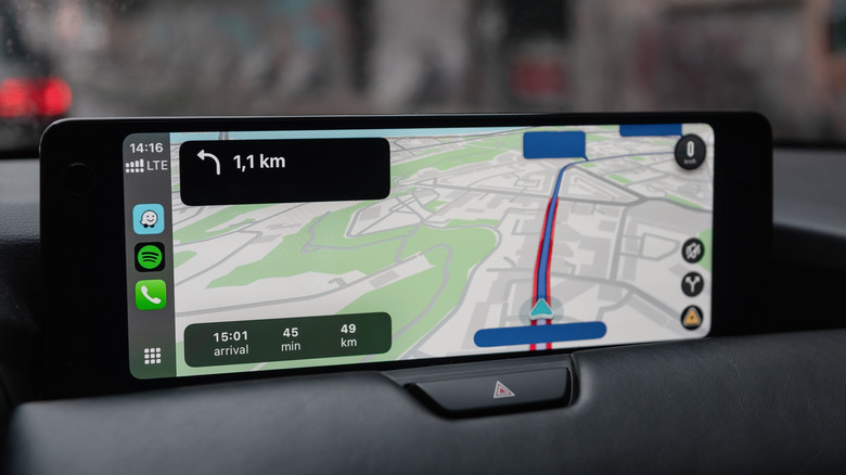 Using a navigation iPhone app with Apple CarPlay.