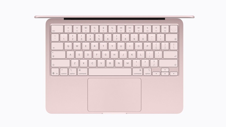 MacBook Neo's keyboard with Touch ID sensor in pink
