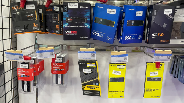 Sticks of RAM and SSDs on a store shelf