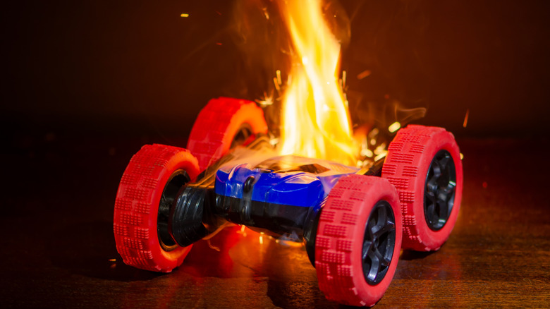 An electric toy with wheels that has caught on fire