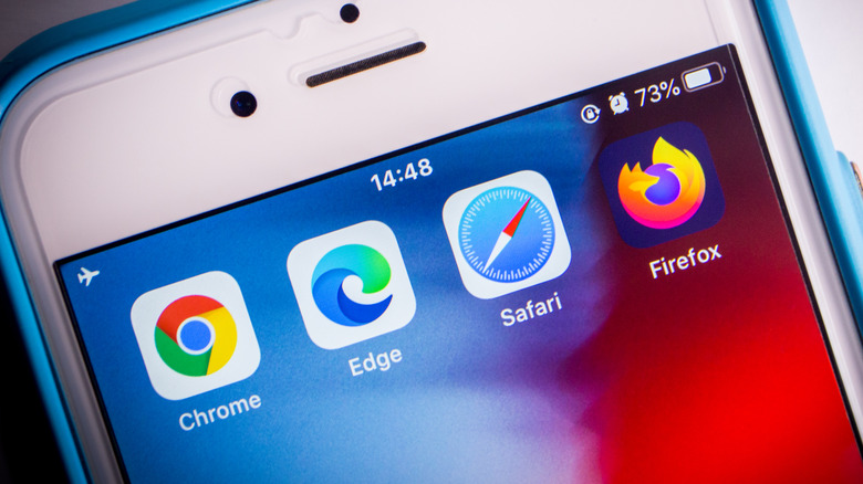 Web browser app icons, including Google Chrome and Microsoft Edge, on an iPhone home screen