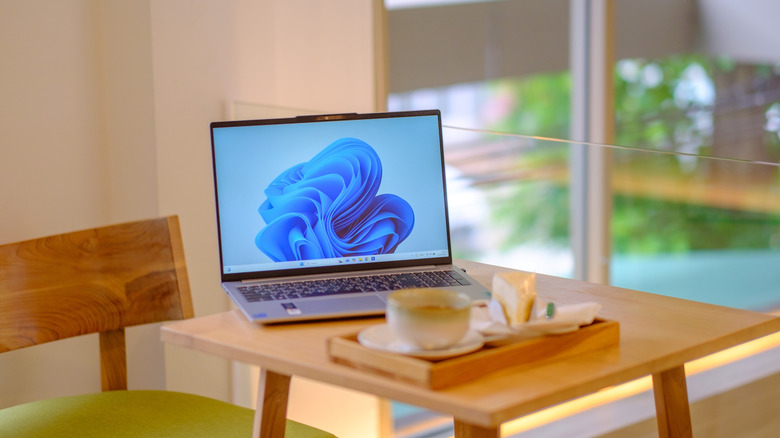 Windows 11 laptop open on a table
