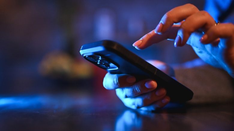 A woman using a smartphone