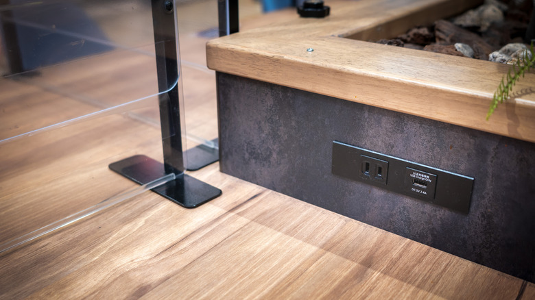 A USB wall socket in a public place.