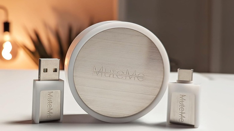 The MuteMe lineup, featuring the original MuteMe (center), the MuteMe Mini USB-A (left), and the MuteMe Mini USB-C (right)