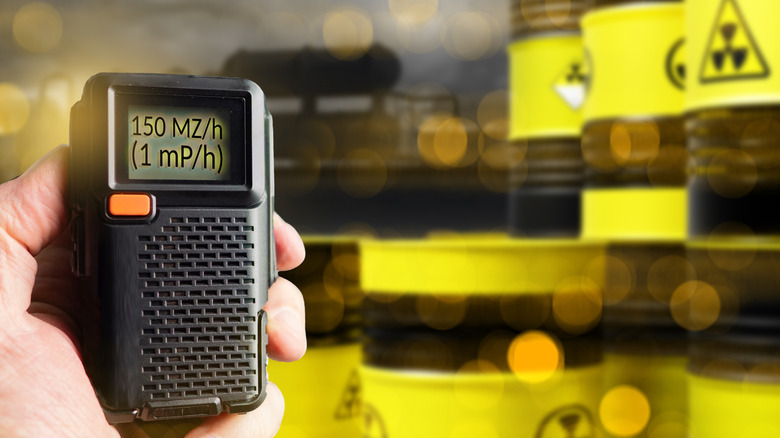 A device being used to measure radioactive emissions from barrels of nuclear waste