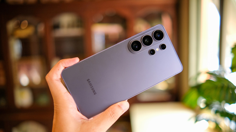 Person holding a Galaxy S26 Ultra phone