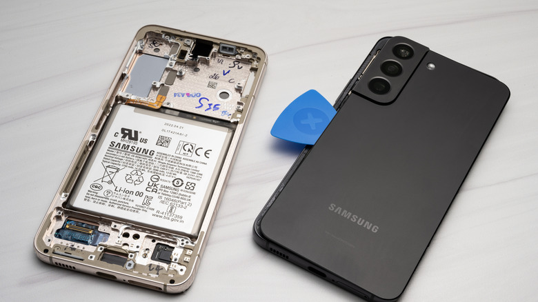 A Galaxy S22 smartphone opened in the back