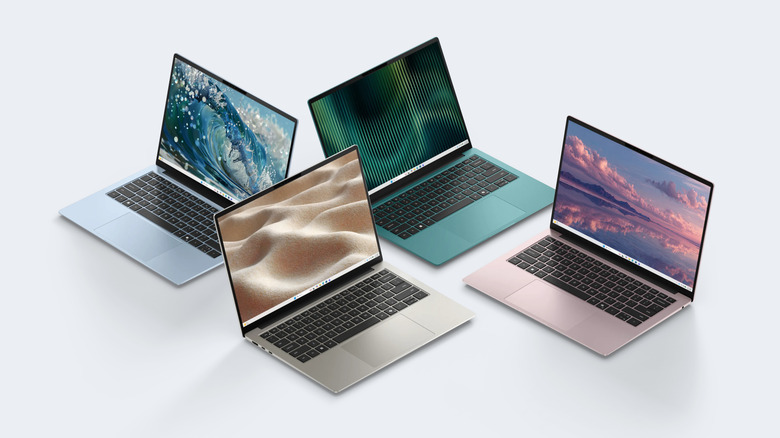 Group of Dell 14S laptops in various color finishes.