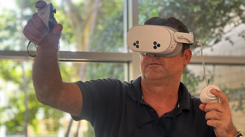 Man wearing Meta Quest 3S VR headset