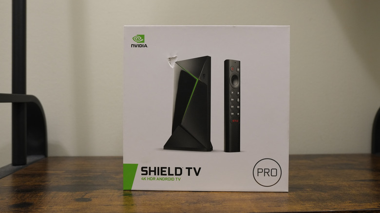 The box for the Nvidia Shield TV Pro placed on a flat, wooden surface.