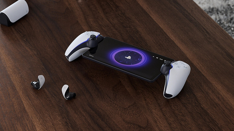 A PlayStation Portal handheld displaying a game with DualSense-style controls.