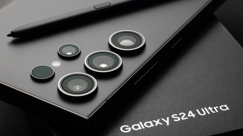 Samsung Galaxy S24 Ultra with S Pen, resting on phone box