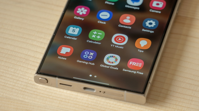 Close-up of the Samsung S24 Ultra displaying its home screen with popular apps