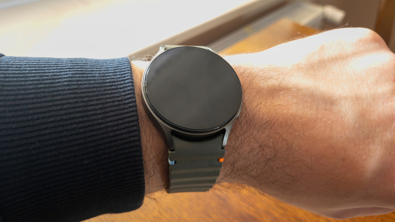 a close up of a Samsung Galaxy Watch 7 on a person's wrist