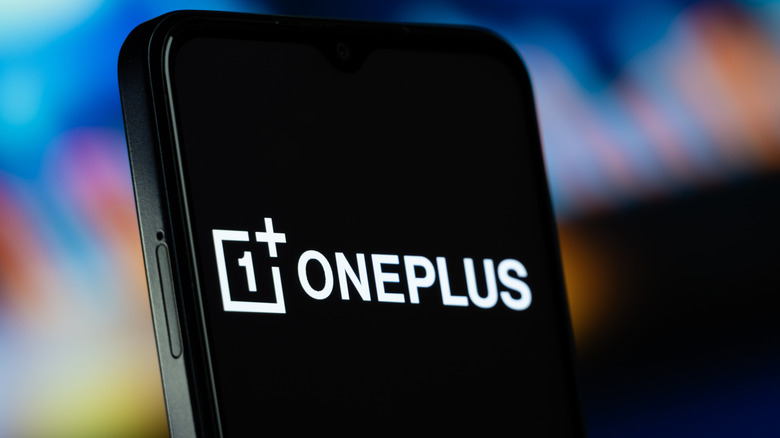 A smartphone displaying the OnePlus logo.