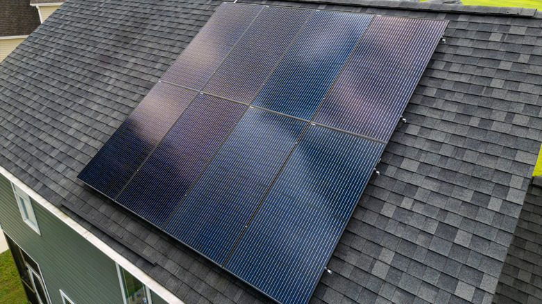 Solar panel array mounted on a house roof