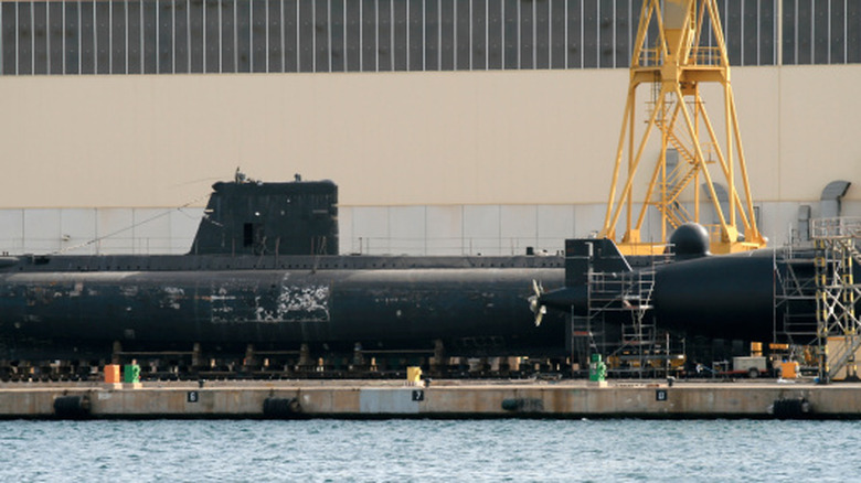 Spanish submarines in a dry dock for repairs
