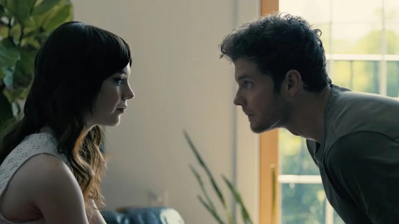 Iris and Josh staring at each other intensely