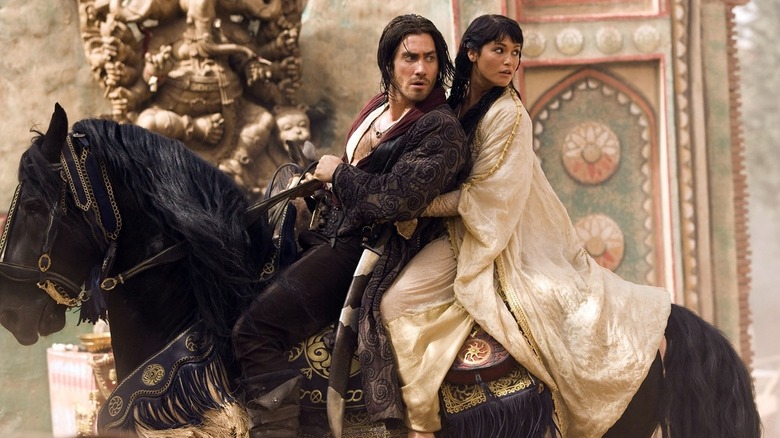 Jake Gyllenhaal and Gemma Arterton on a horse in Prince of Persia: The Sands of Time