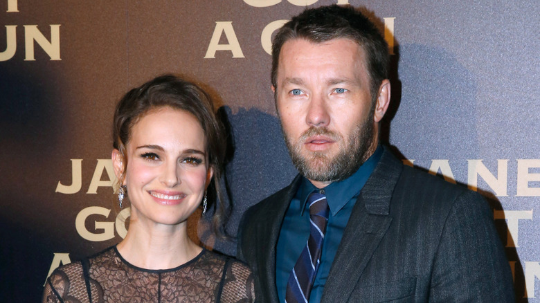 Natalie Portman and Joel Edgerton smiling on the red carpet