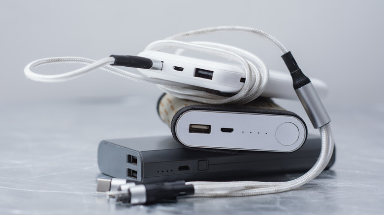 Portable power banks with charging cables