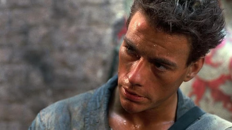 Gibson Rickenbacker (Jean-Claude Van Damme) tilting his head in 