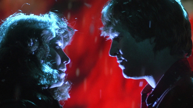 Jenny (Karen Allen) and Starman (Jeff Bridges) looking at each other in 