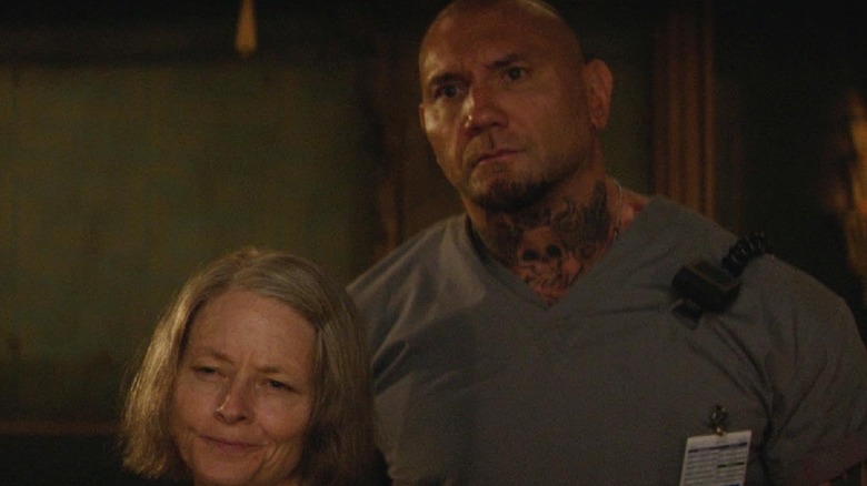 Jodie Foster and Dave Bautista stood together in Hotel Artemis