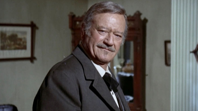 J.B. Brooks (John Wayne) turning around in 